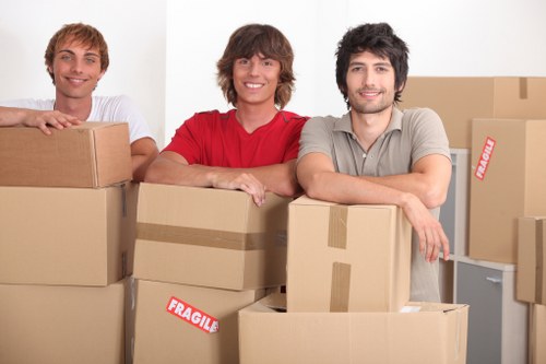 Office relocation planning in Knightsbridge with moving team and boxes