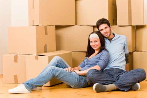 Packed office furniture and equipment prepared for a business move