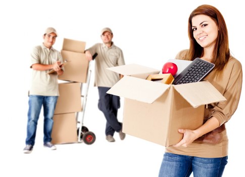 Packed household items being loaded into a moving truck in Knightsbridge