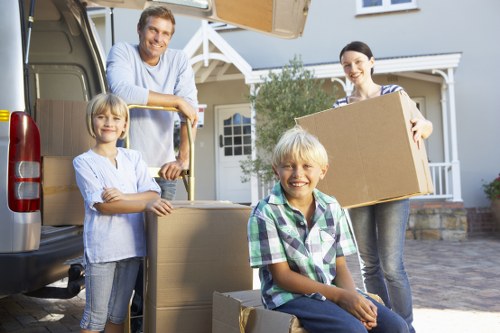 Careful wrapping of fragile household items during a local move