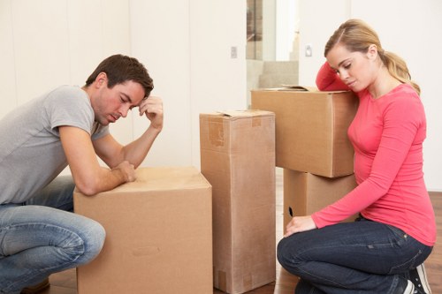 Removal team preparing a move in Knightsbridge with furniture and boxes