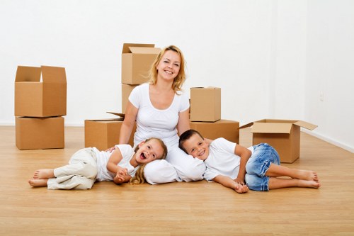 Packed boxes and protected furniture ready for a central London removal