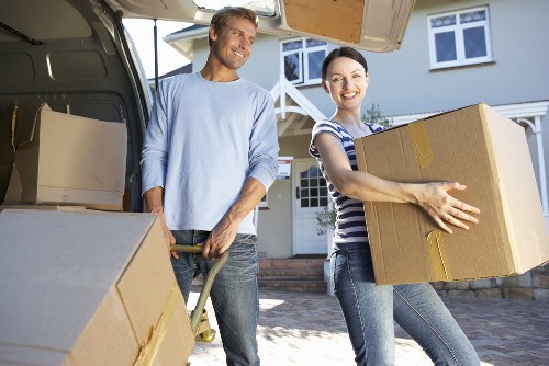 Local crew removing household furniture from a managed Knightsbridge property